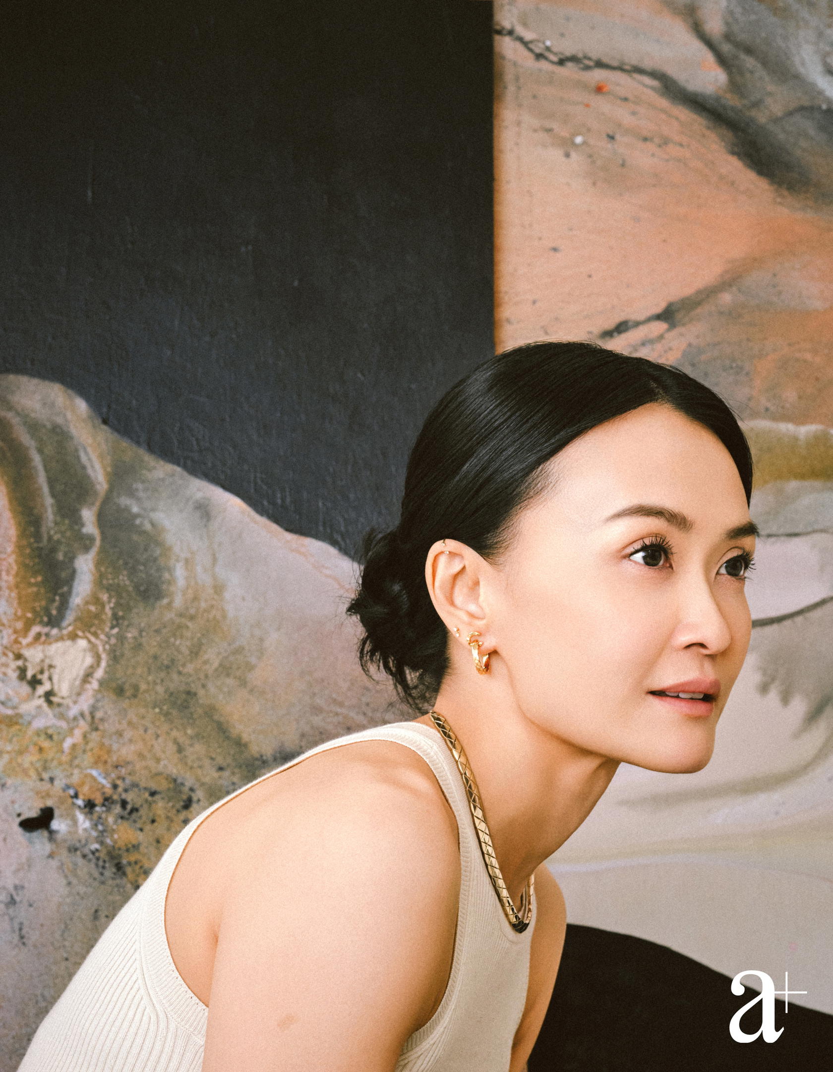 Coco Crush hoops and Coco Crush supple necklace in beige gold. Silk knit top all from Chanel (Credit: Stefan Khoo)