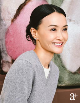 Coco Crush ear cuff in white gold with diamonds and Comete Geode earrings in white gold with diamonds. Cotton and silk knit top and cashmere sweater all from Chanel