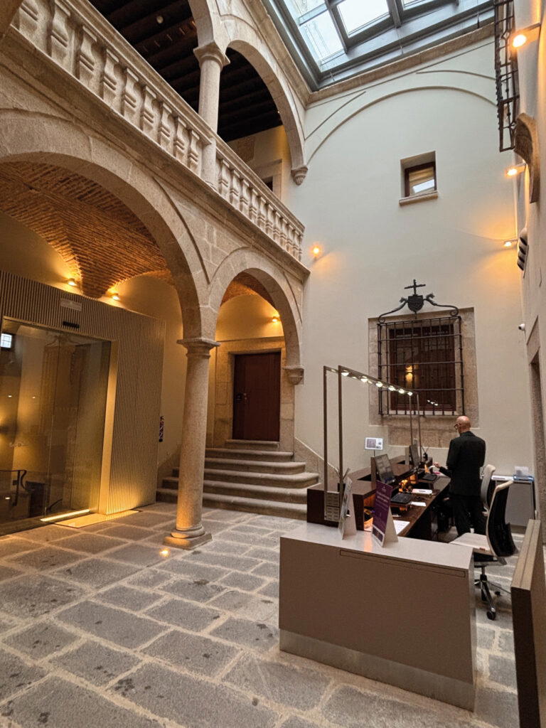 Set in a 14th-century stone palace, Parador de Cáceres’ original features include vaulted ceilings and antique furnishings (Credit: Kalpana Sunder)