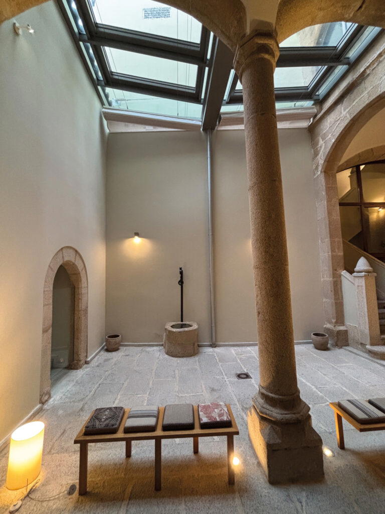 The traditional courtyard in the Parador de Cáceres (Credit: Kalpana Sunder)