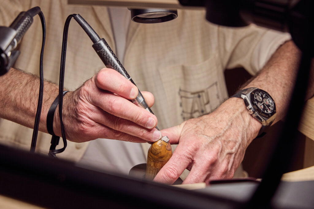 A watchmaker at work: one of several AP craftsmen who made the journey from Le Brassus to Andermatt (Credit: Audemars Piguet)