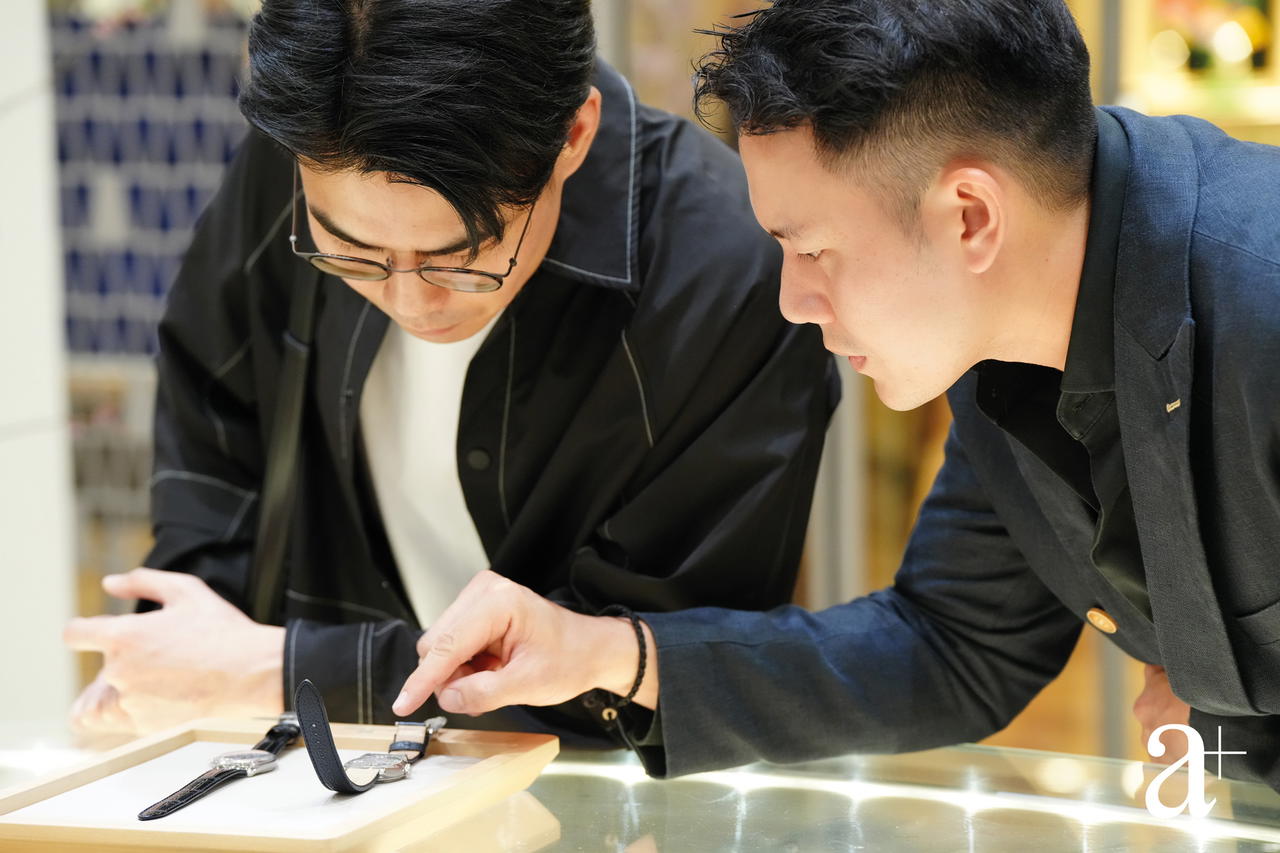 Alvin Lee and Russell Ng studying the finer details of watchmaking at The Grand Seiko boutique