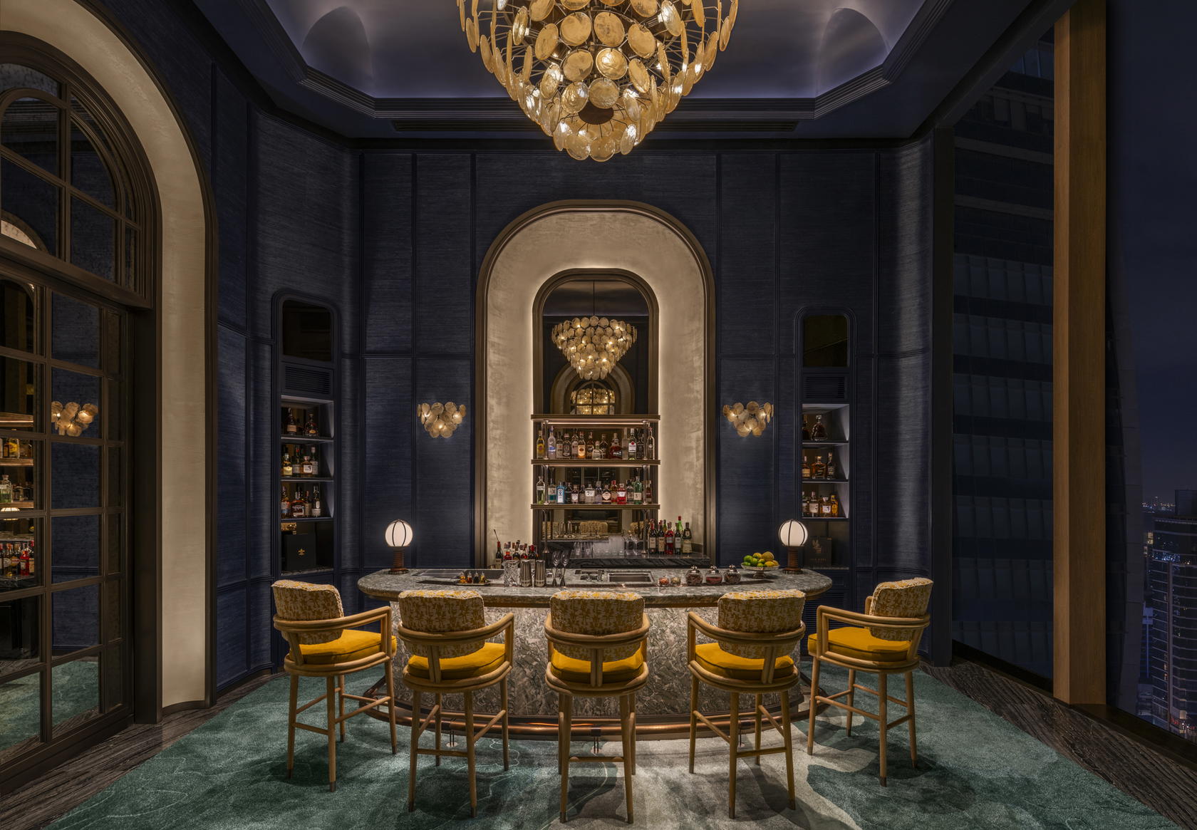 A hidden speakeasy bar at Piscari is the perfect place to unwind with a custom cocktail in hand (Credit: Andaz)