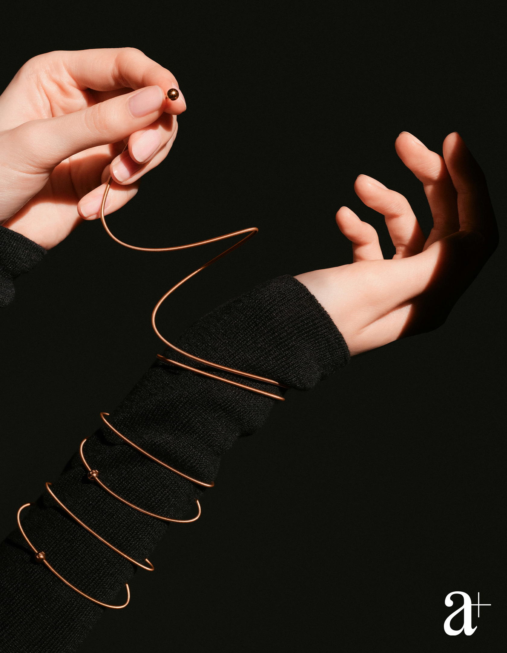 Niessing Colette C bracelet 4 windings in Classic Yellow gold, Niessing Colette bracelet 2 windings in Classic Red and Classic Yellow gold (Credit: Stefan Khoo)