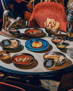 New menu items include Nut Kraken, Big Baller, Papi's Jammed Gun, and Papads with chutneys (Credit: Firangi Superstar)