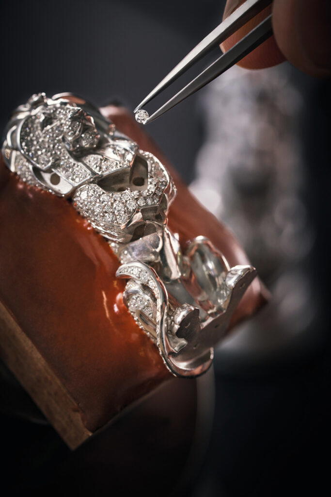 The snow setting covers all white gold pieces (except the queen), creating a continuous pattern (Credit: Chanel)