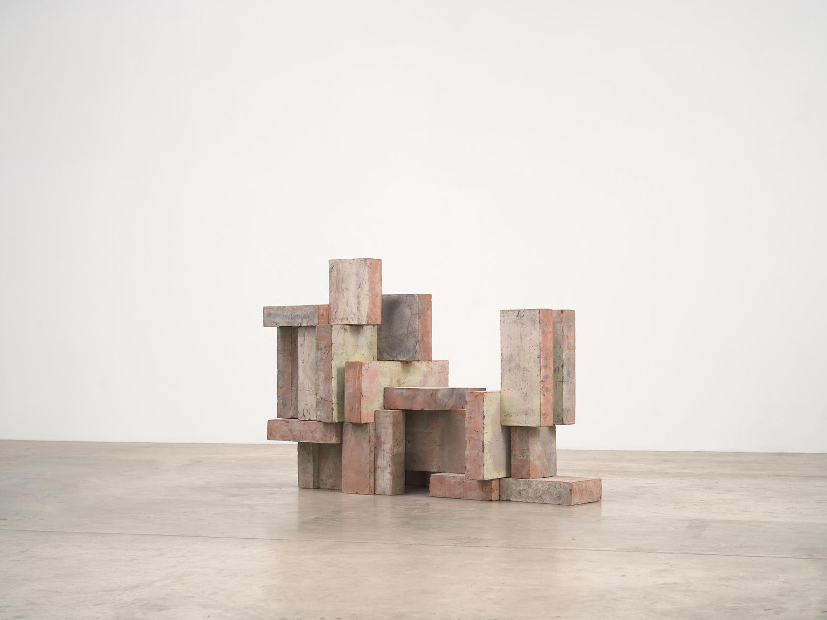 Oversized clay figures are stacked one upon another in ‘Close’, 2025 (Credit: Antony Gormley and Galleria Continua)