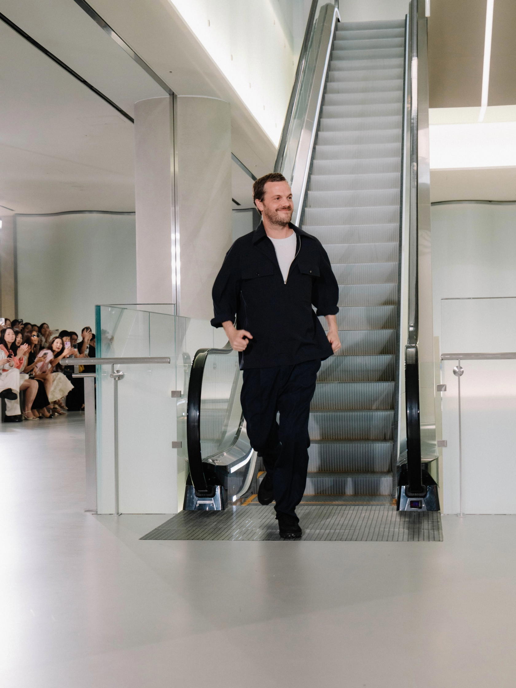 A triumphant Blazy taking his bow at the Seoul Replica Métiers d’Art show (Credit: Chanel)
