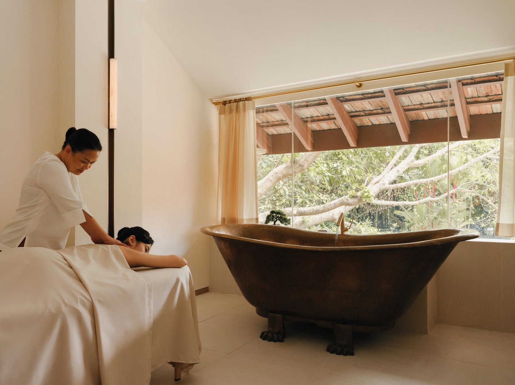 The Sentosa Signature Massage at Raffles Sentosa Spa uses long, deliberate strokes to ease the body into calm (Credit: Raffles Sentosa Singapore)