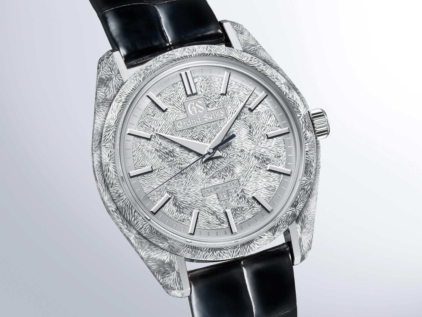 Grand Seiko SBGZ011 features engravings on both the case and dial that depict the Tateshina Waterfall in Shinshu (Credit: Grand Seiko)