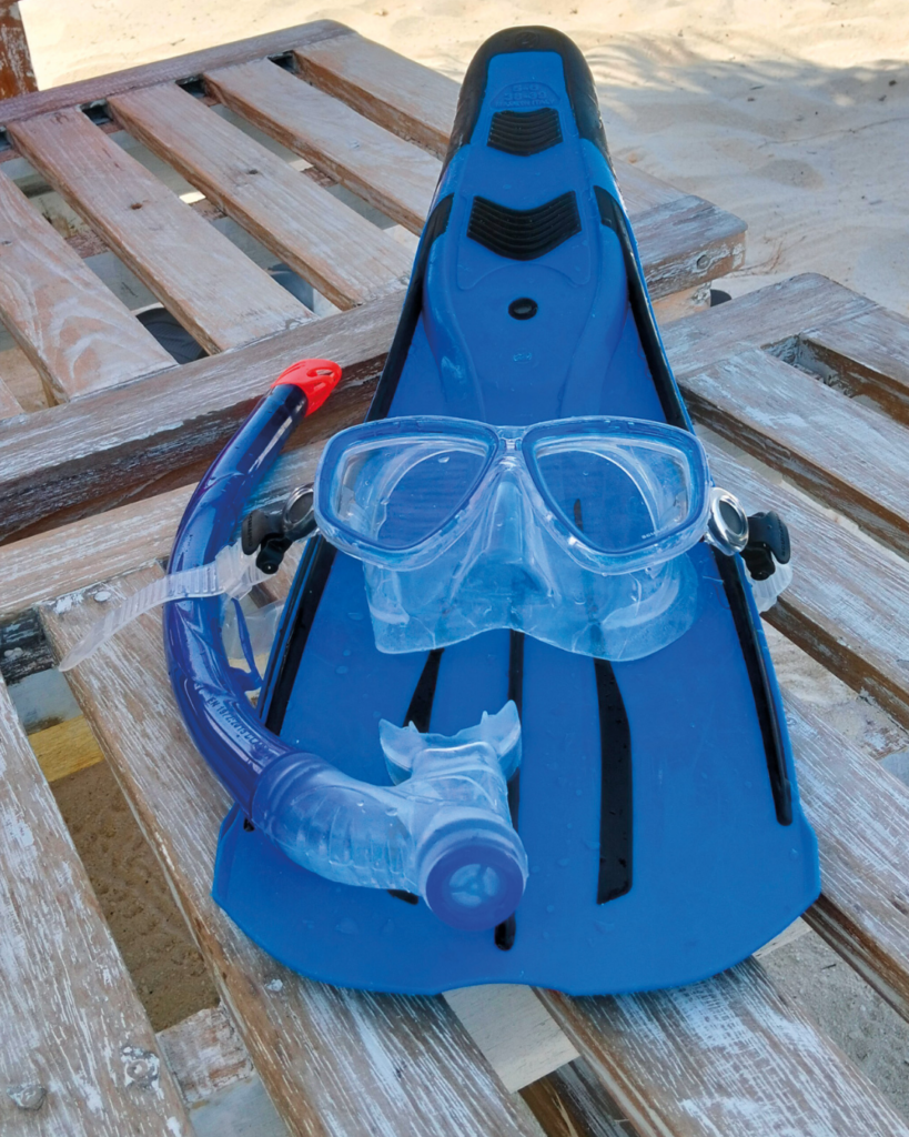 Equipped with a mask, snorkel, and fins, I’m all set to explore! (Credit: Mary Lim)