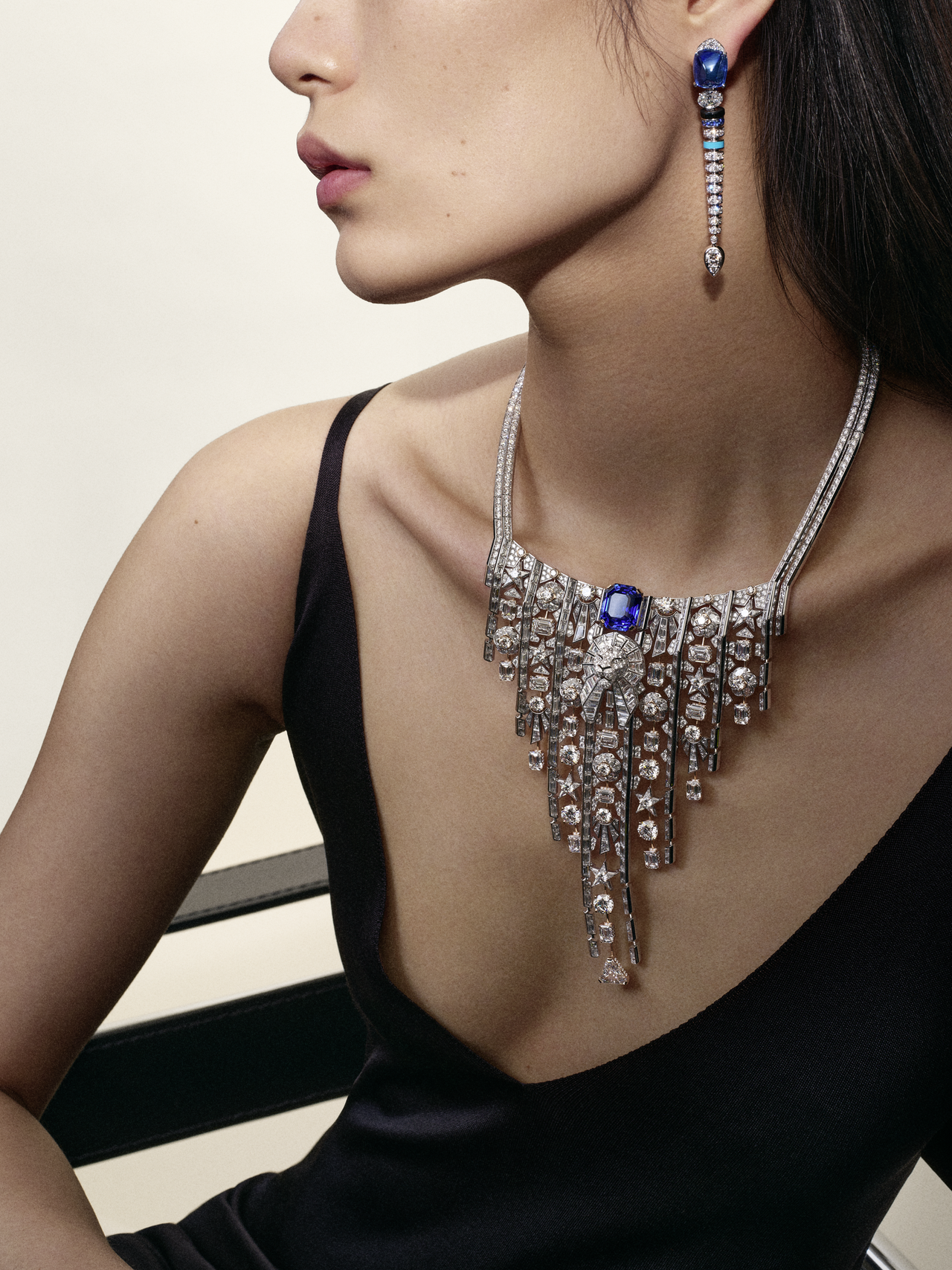 Model wears Chanel Imprimé lion necklace