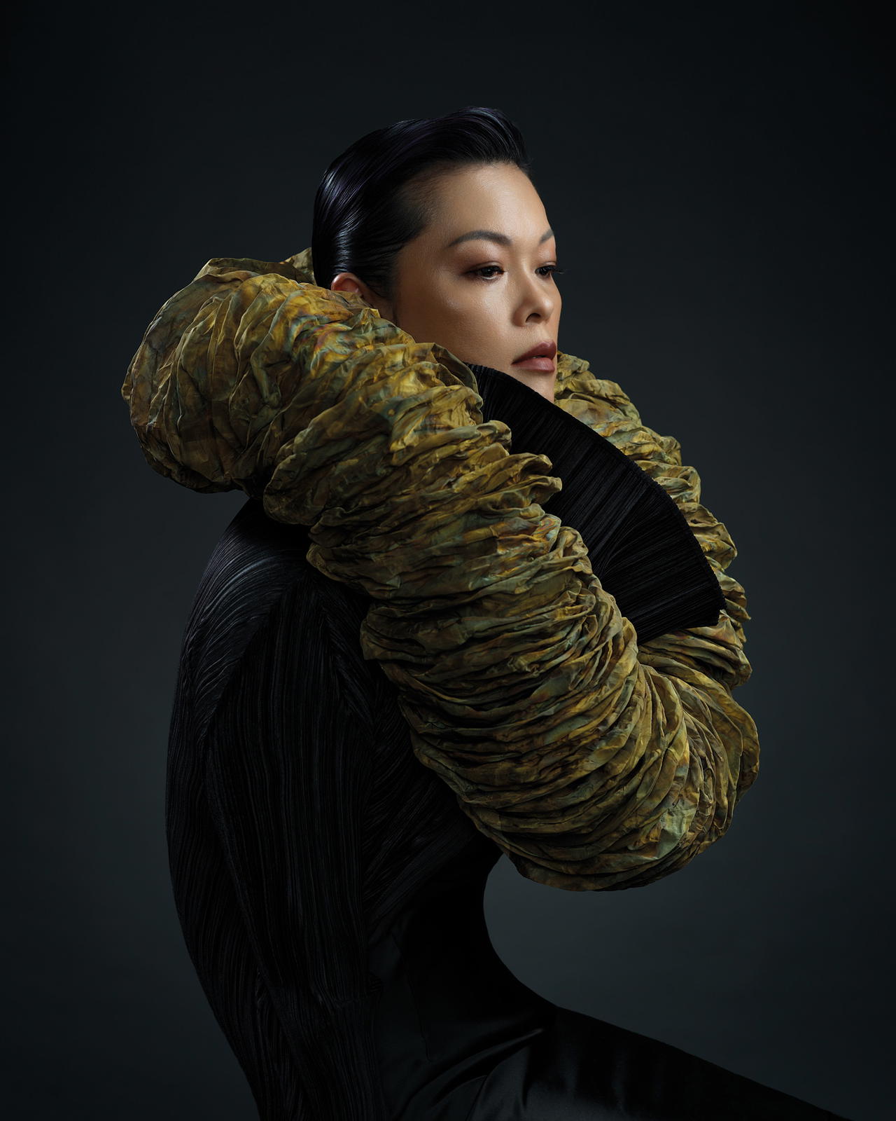 Ida Ng, CEO of Helu-Trans Group, models a piece from the 2026 ‘Malai’ Series (Credit: Punsiri Siriwetchapun)