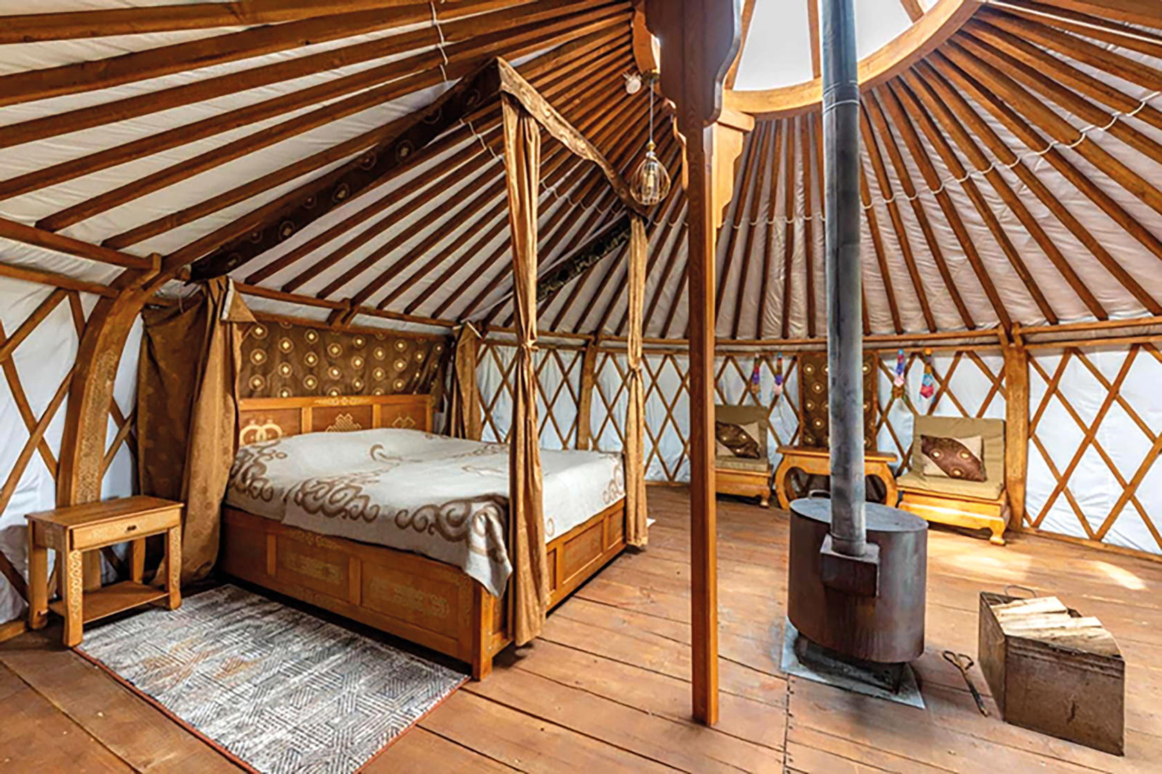 Mongolian furniture and cashmere blankets in a ger (Credit: S. Cabibel)