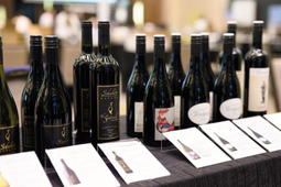 A line up of wines at a booth at Grape Escape 2025 (Credit: Sommelier Association of Singapore)