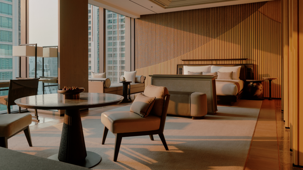 Among the amenities include a spacious workdesk, retractable smart TV, and large daybed (Credit: Aman Nai Lert Bangkok)