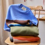 Intarsia sweaters featuring Hélain's landscapes (Credit: Longchamp)
