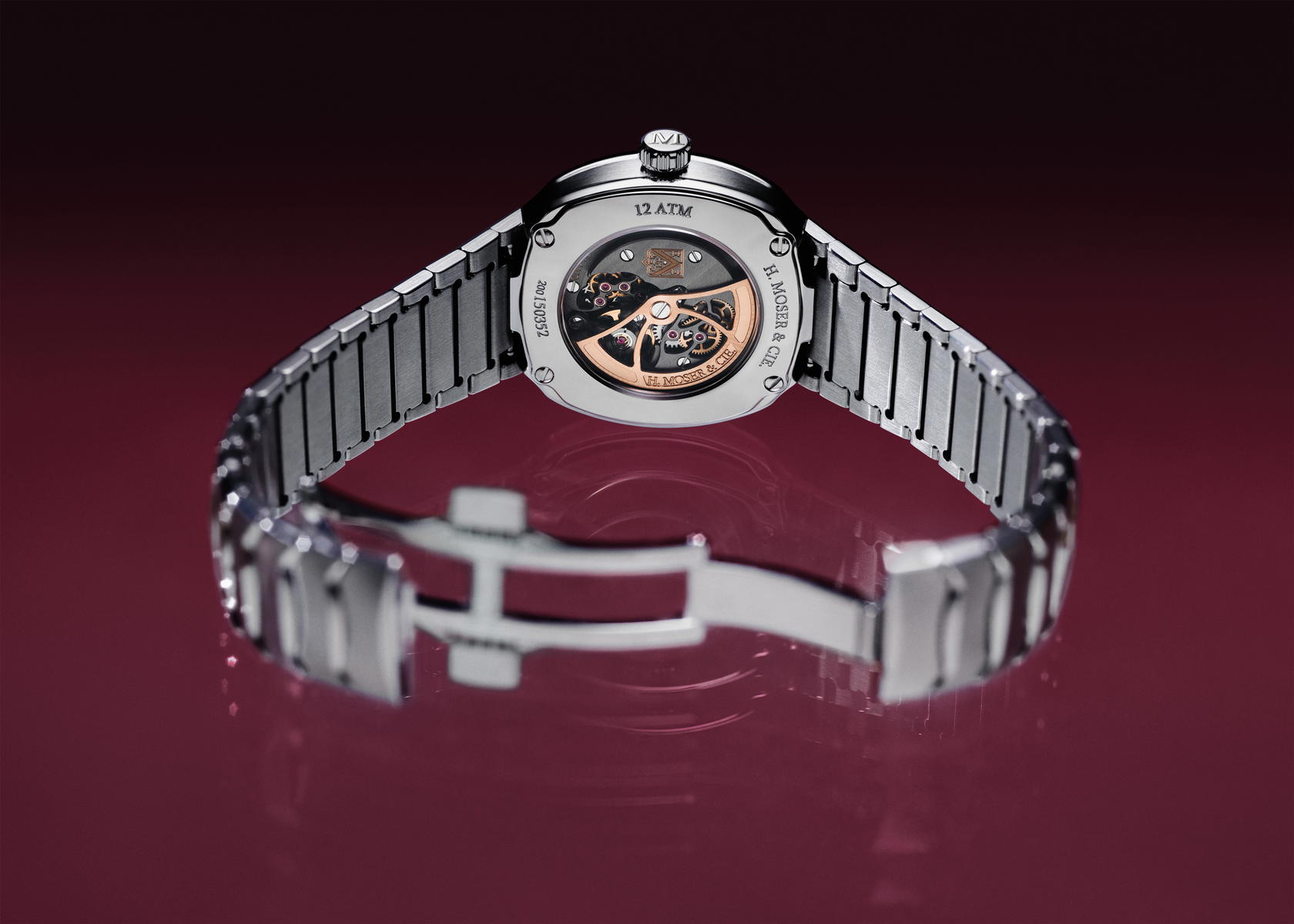 Visible through the sapphire caseback, the manufacture movement features H. Moser & Cie.’s signature anthracite finish, Moser double stripes, partially skeletonised bridges and a red gold oscillating weight (Credit: H. Moser & Cie)