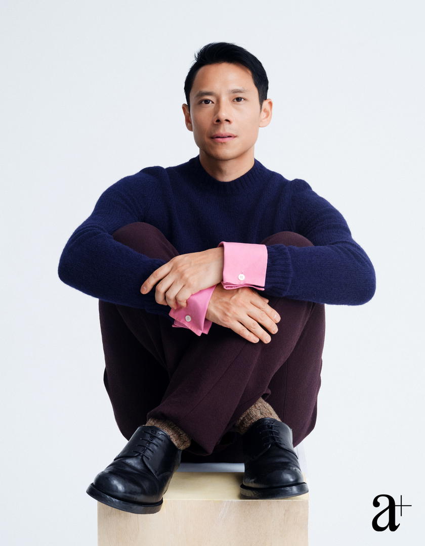 Wool sweater with detachable cuffs, wool trousers, and distressed calfskin lace-ups, all from Prada (Credit: Stefan Khoo. )