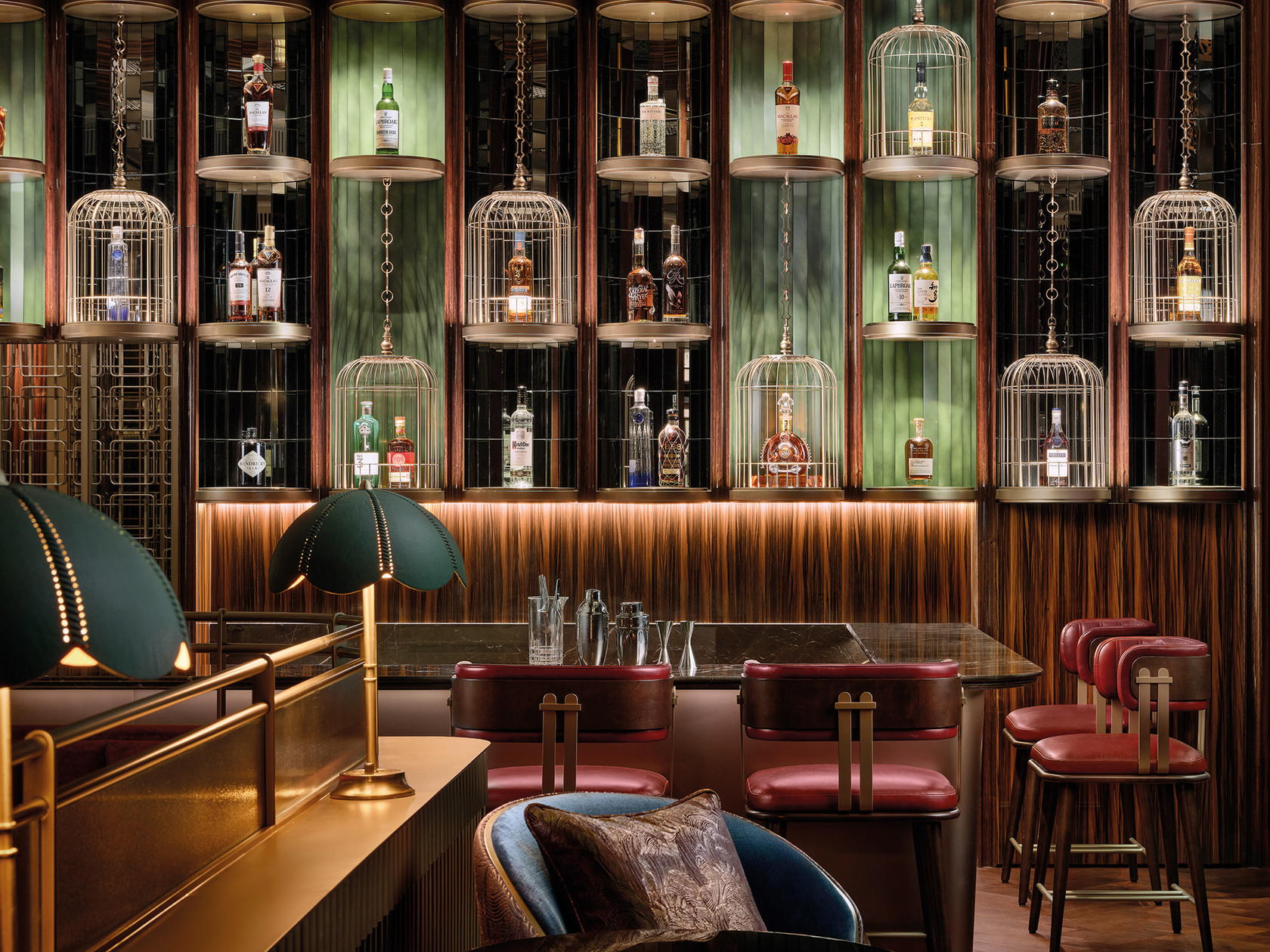 The photo-worthy back bar of The St. Regis Bar features bird cages (Credit: The St. Regis Bar Singapore)