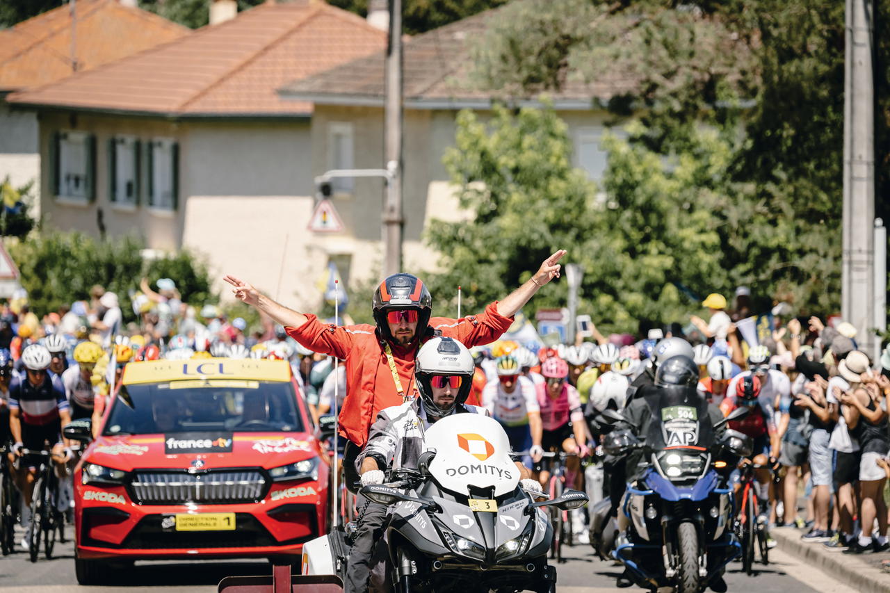Marino in action as part of the Tour de France race direction team during Stage 13 from Chatillon-sur-Chalaronne to Grand Colombier, on 14 July 2023 (Credit: Amaury Sport Organisation)