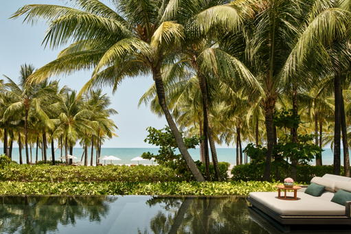 The Regent Phu Quoc is where to enjoy powdery white beaches, warm turquoise waters, and lush emerald jungles, set against the island’s glorious sunsets (Credit: Regent Phu Quoc)