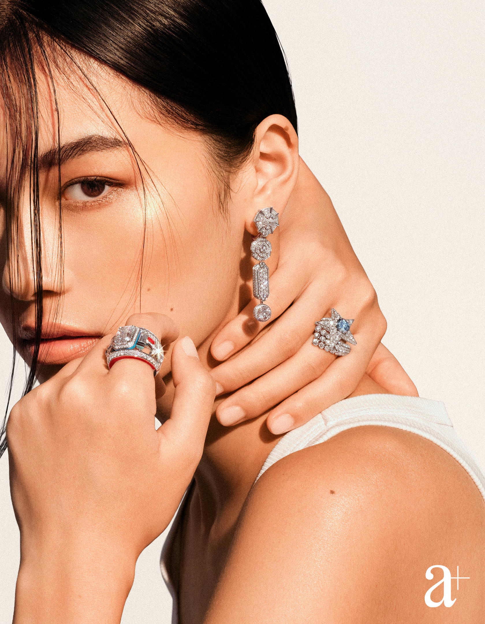 Imprime Bandeau ring in platinum and white gold with diamonds, turquoise, chrysoprase and red lacquer, Talisman de Symboles earrings in white gold with diamonds and Comete Volute ring in platinum with diamonds and a blue diamond, all from Chanel High Jewellery (Credit: Stefan Khoo)