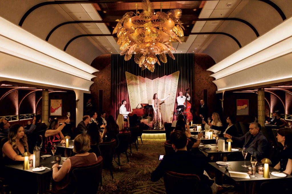 In a nod to filmdom’s golden age, the Hollywoodland Supper Club serves multi-course meals (Credit: Royal Caribbean)