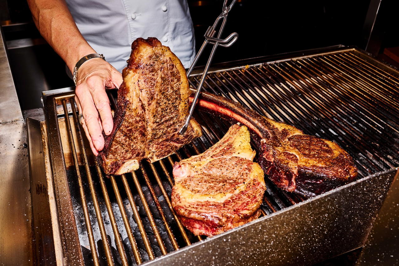 Wood-fired steaks are a highlight at the Playing With Fire dinner (Credit: QT Singapore)