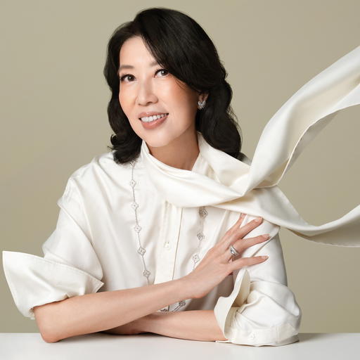 Two Butterfly earrings in white gold with diamonds, Vintage Alhambra necklace in white gold with diamonds, and Perlée ring in white gold with diamonds, all from Van Cleef & Arpels. Blouse, stylist's own (Credit: Wee Khim )