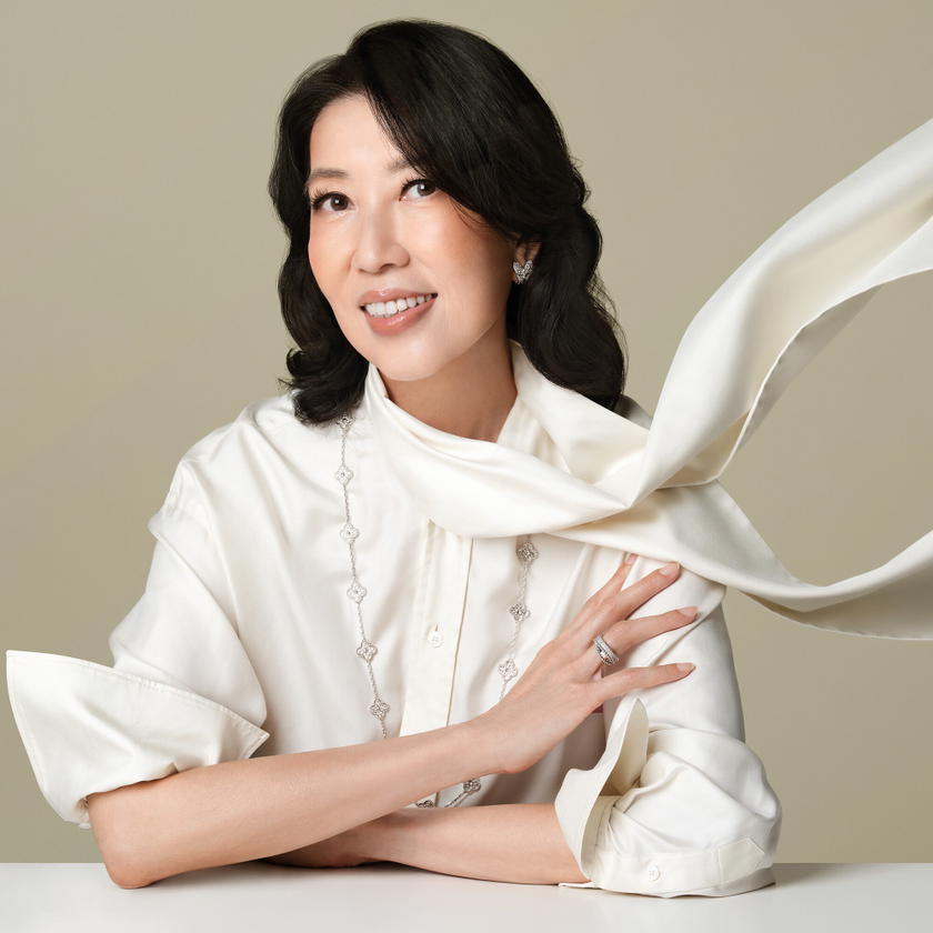 Two Butterfly earrings in white gold with diamonds, Vintage Alhambra necklace in white gold with diamonds, and Perlée ring in white gold with diamonds, all from Van Cleef & Arpels. Blouse, stylist's own (Credit: Wee Khim )
