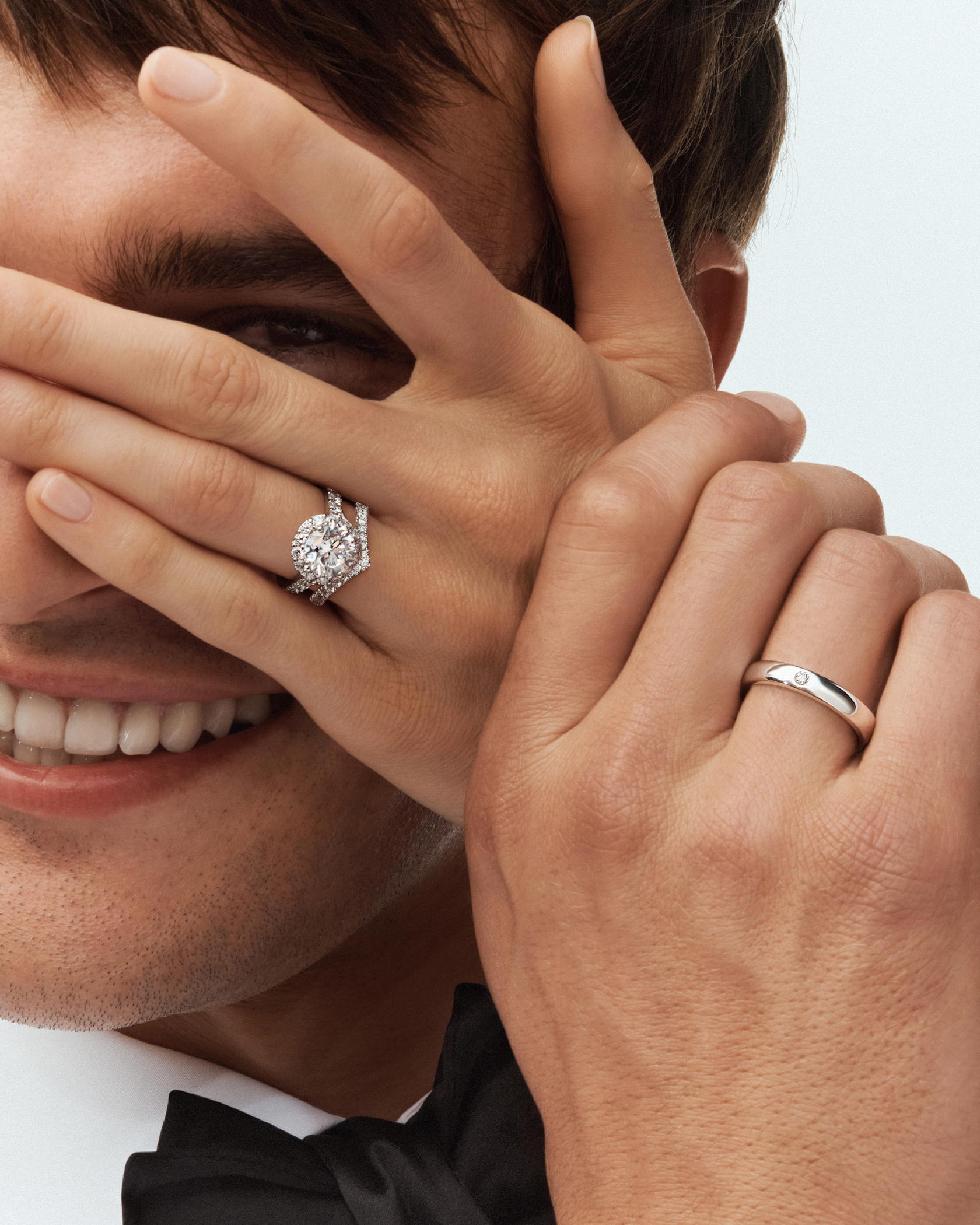 Icon ring in white gold with diamonds, V shape wedding band in white gold with diamonds, and Eternity band in white gold with a diamond (Credit: Graff)